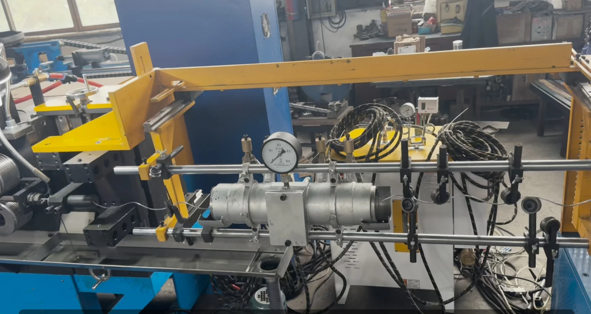 Inline High Temperature Steam Cleaning Unit Connected To A Preformed Armor Rod Forming Machine